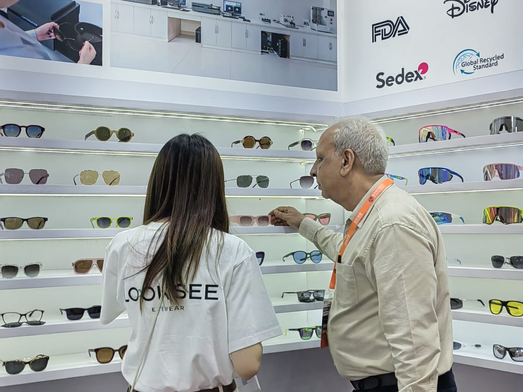 At WOF, Looksee's sales are talking with customers.