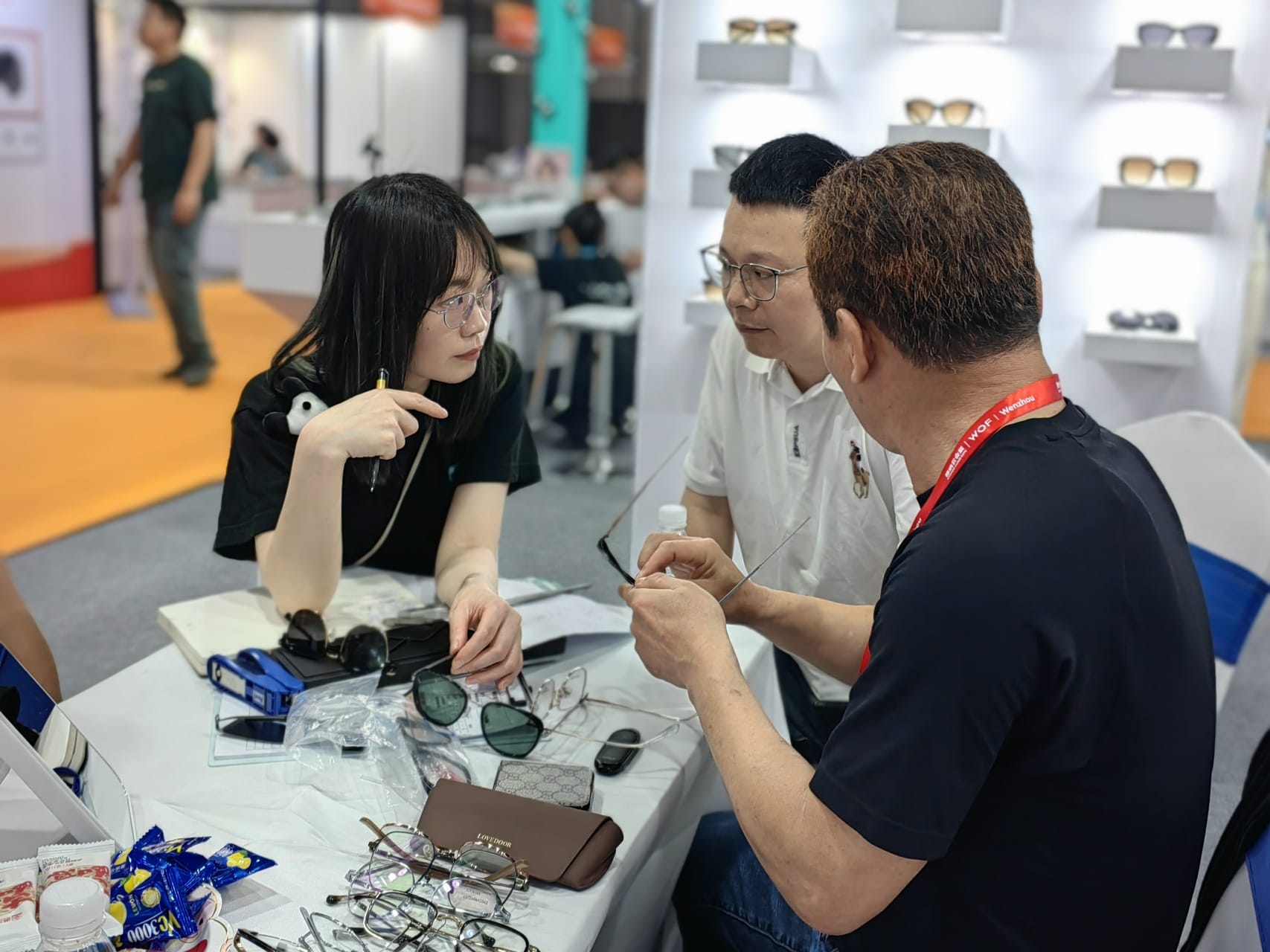 At WOF, Looksee's sales are talking with customers.